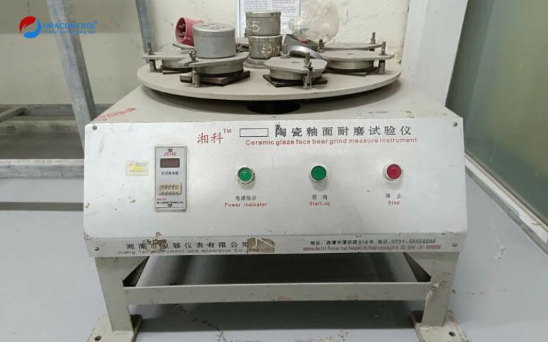 Máy mài mòn bề mặt gạch OPACONTROL